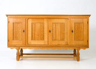 STYLE OF HENNING KJAERNULF OAK SIDEBOARD C. 1960S