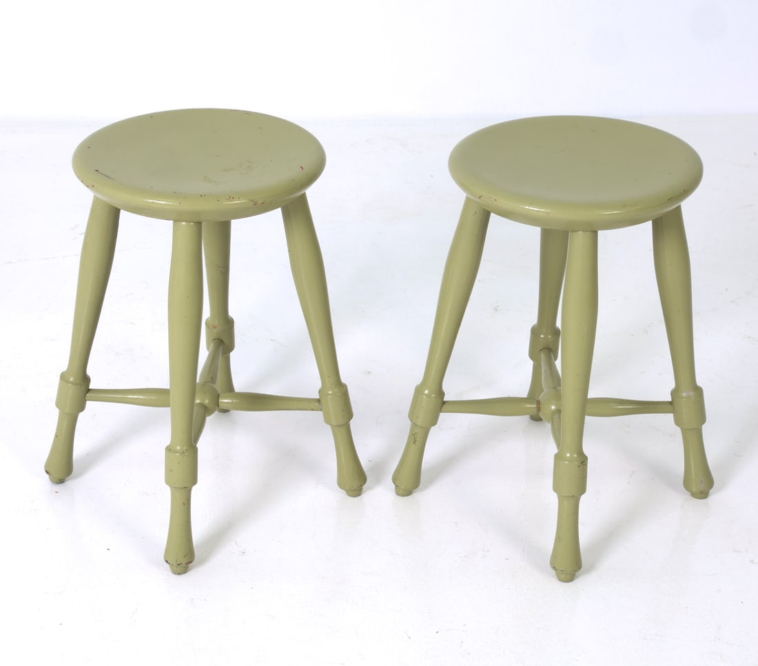 PAIR OF SCANDINAVIAN PAINTED PINE STOOLS C. 1940S: Green painted pine stools with X-form base. Scandinavian, circa 1940s. Dimensions: H 18.75" x Dia. 12" Conditions: Wear consistent with age and use including dings and rubs to seats and legs. ES2-48