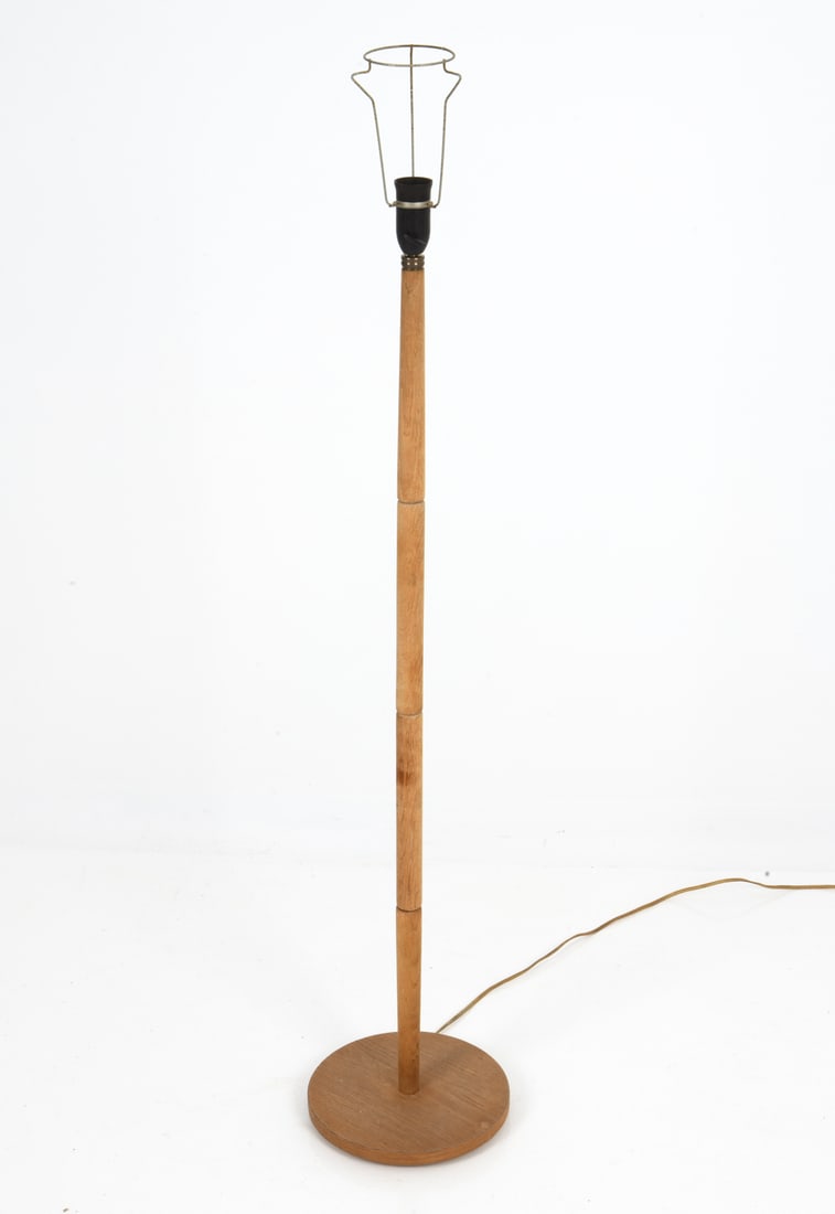 MID-CENTURY DANISH OAK FLOOR LAMP CIRCA 1960'S.: Round base and segmented column. Denmark, cica 1960's. Dimensions: H 60" x W 10" Condition: Untested, European plug. Few scuffs and nicks to base. Minor signs of repairing to socket. No shade. ES2-170
