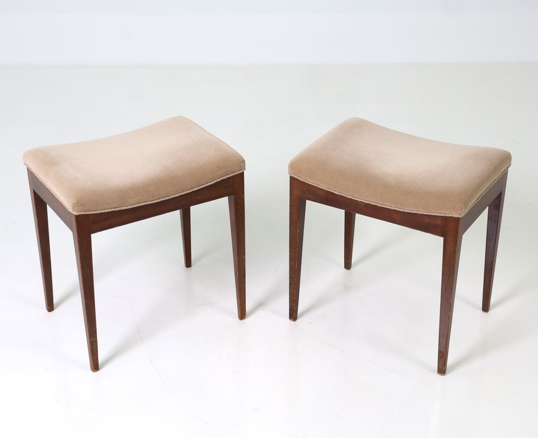PAIR OF DANISH FOOTSTOOLS C. 1950S: Wooden bases with upholstered tops and rope trim. Dimensions: H 19" x W 17.75" x D 13.5" Condition: Wear consistent with age and use including rubs, scuffs, and scratches to legs. ES2-126