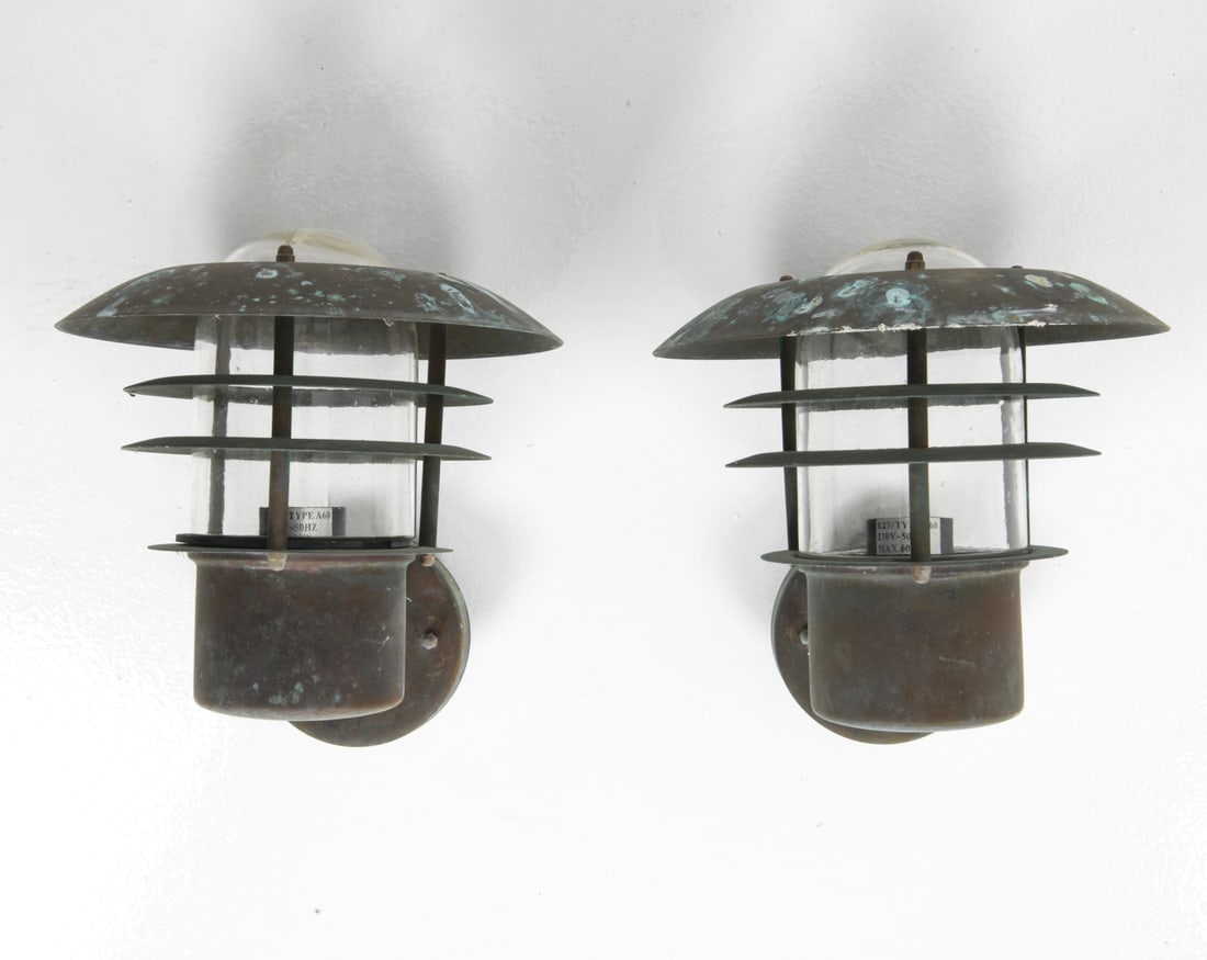 PAIR ATTR. NORDLUX DANISH COPPER OUTDOOR SCONCES: Apparently unmarked. Dimensions: H 10" x W 8.5" x D 9" Condition: Untested. Wear consistent with outdoor use including oxidation and spots of soiling. G513