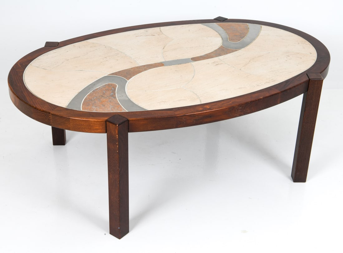 TUE POULSEN DANISH CERAMIC TILE COFFEE TABLE 1970S: For Haslev. Oval tiled rosewood coffee table. Apparently unmarked. Denmark, circa 1970's. Dimensions: H 19.75" x W 54.5" x D 32" Condition: Signs of use and wear consistent with age. Couple of minor n