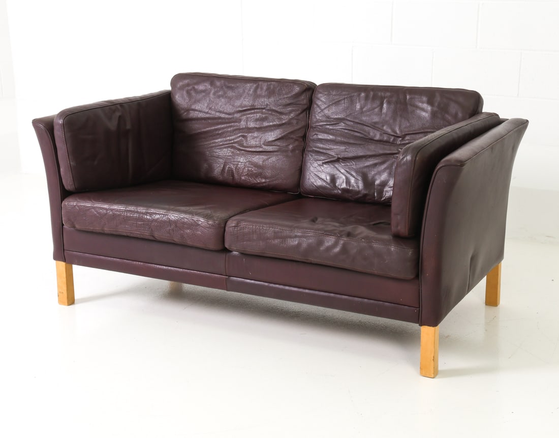 ATTR. BORGE MOGENSEN DANISH LEATHER LOVESEAT SOFA: Beautiful loveseat leather sofa attributed to Danish designer Borge Mogensen. Apparently unmarked. Denmark, circa 1970's. Dimensions: H 30" x W 61" x D 30" x SH 16" Condition: Very light signs of use