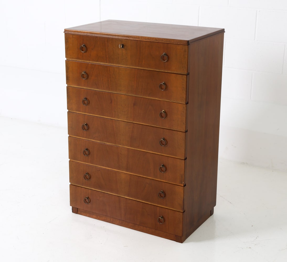DANISH TEAK CHEST OF DRAWERS C. 1950S: With round brass pulls. Key Included Dimensions: H 40.25" x W 27.5" x D 16.75" Condition: Wear consistent with age and use G093