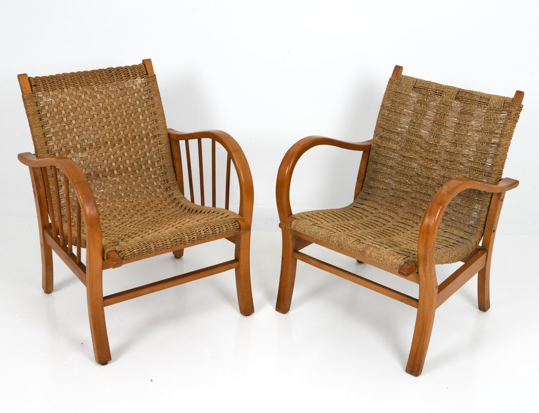 (2) ERICH DIECKMANN GERMAN LOUNGE CHAIRS: Beech frame Bauhaus chairs featuring woven papercord seat and backrest. Germany, 1930s. Dimensions: H 30" x W 22.5" x D 24" x Sh 14.75" Condition: Wear consistent with age and use including rubs and s