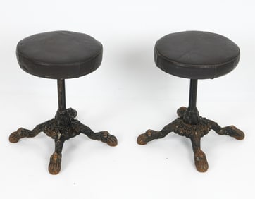 PAIR OF ANTIQUE CAST IRON & LEATHER STOOLS