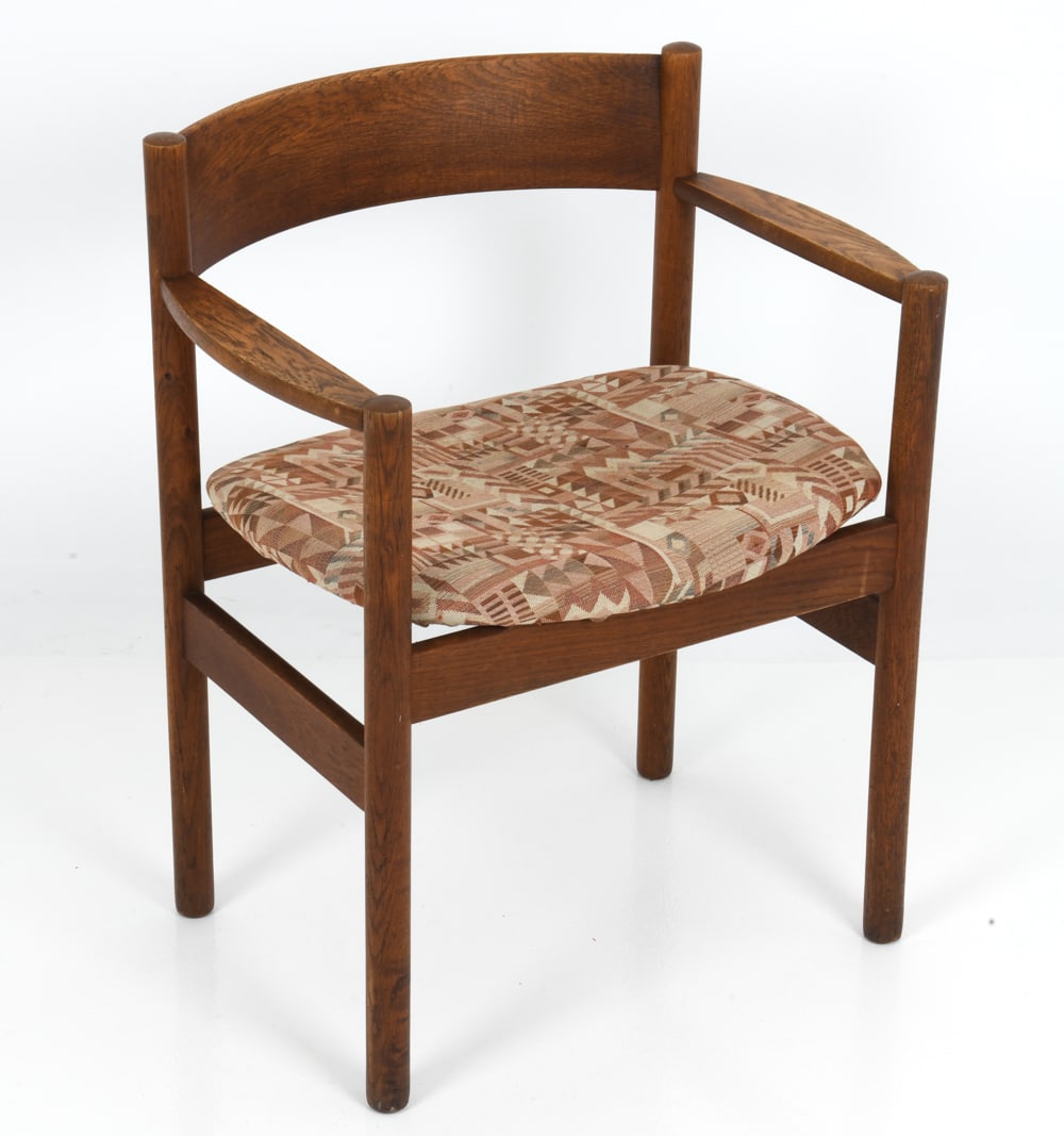 JORGEN BAEKMARK FOR FDB MOBLER DANISH OAK CHAIR: "J86" model. Stained oak frame and armrests, with geometric pattern upholstered seat. Marked and dated to underside. Denmark, circa 1960's. Dimensions: H 29" x W 23.5" x D 20.5" x SH 17.75" Condition: