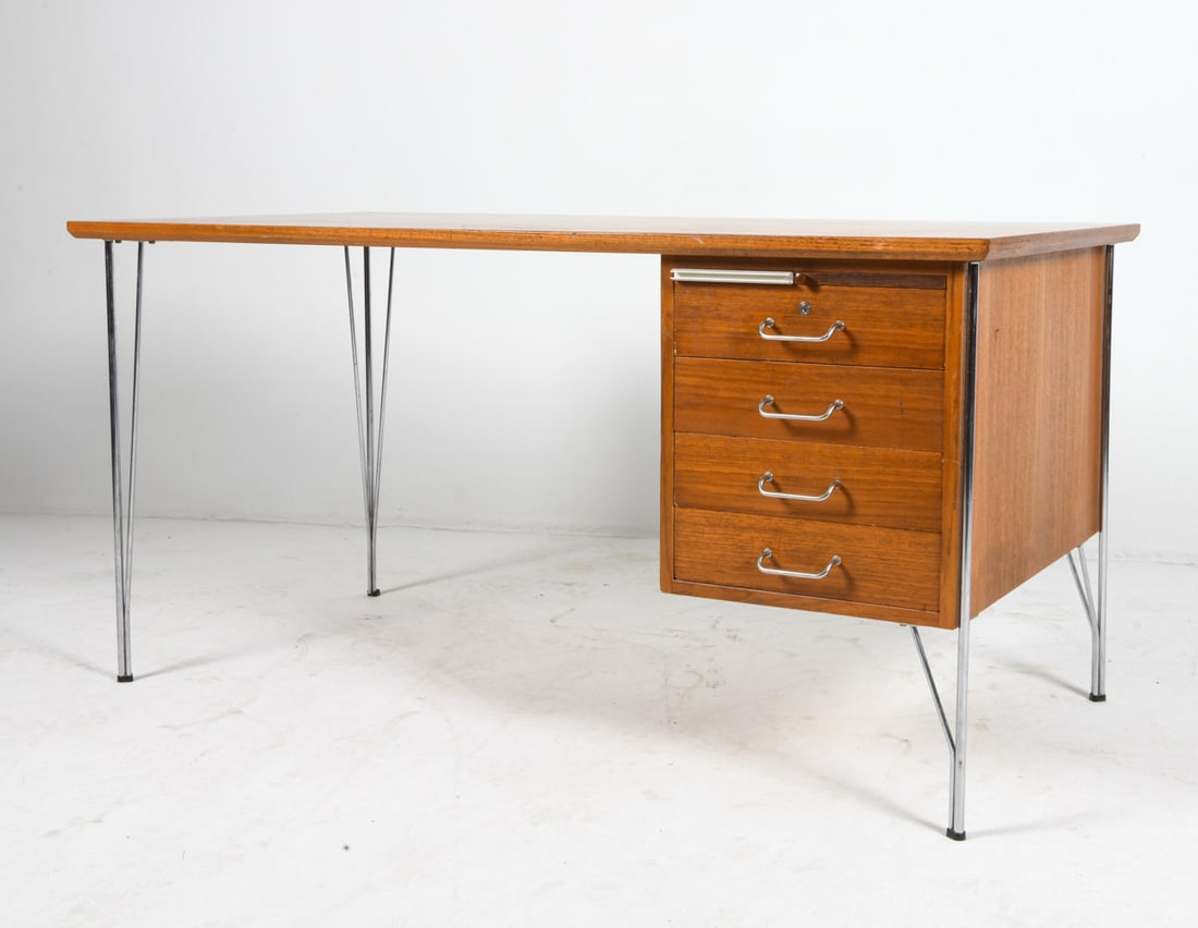 HEINRICH ROEPSTORFF DANISH TEAK DESK C. 1960S: Tagged underneath. Teak writing desk with steel legs. Denmark, circa 1960s. Dimensions: H 29.5" x W 59.5" x D 29.5". Condition: Wear consistent with age and use, including rubs and scuffs to frame.