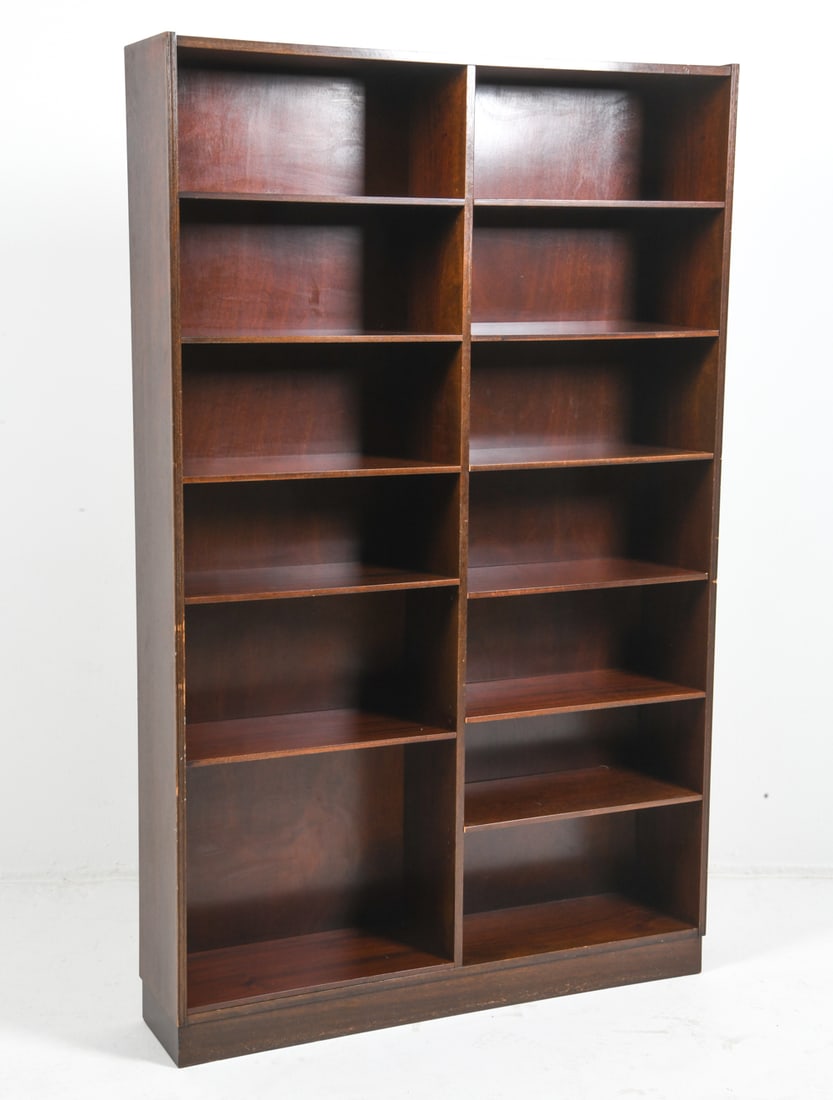 STYLE OF HUNDEVAD DANISH ROSEWOOD BOOKCASE C.1970S: Adjustable shelves. Denmark, circa 1970s. Dimensions: H 79" x W 49" x D 19". Condition: Minor Scratches. Wear consistent with age and use.