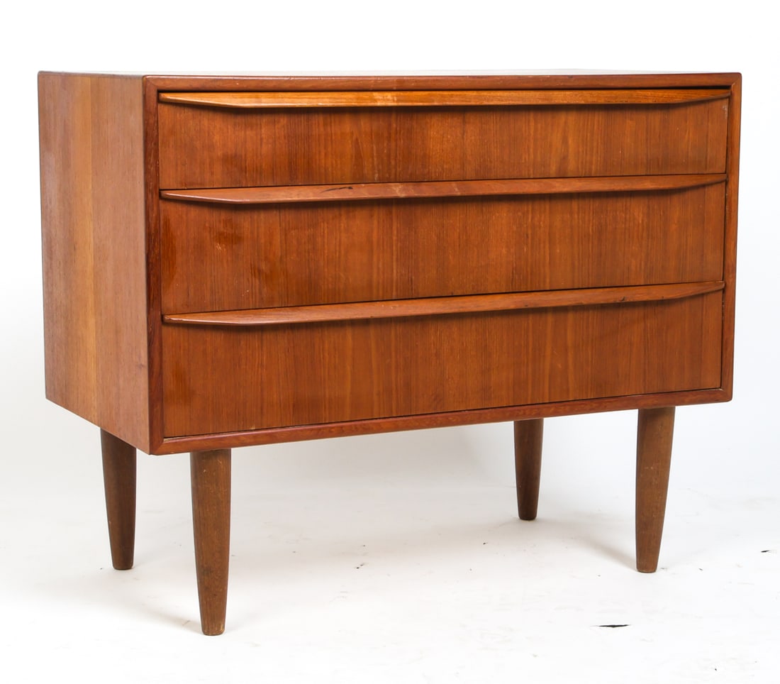 DANISH TEAK CHEST OF DRAWERS C. 1960S: Chest of drawers with compartment in top drawer. Likely had a mirror affixed to lid. Denmark, circa 1960s. Dimensions: H 25.25" x W 30.75" x D 16". Conditions: Wear consistent with age and use
