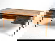 HENNINGSEN STYLE DANISH WALNUT WRITING DESK 1960S: Key included. Walnut writing desk with brass pulls for oak drawers. Denmark, circa 1960s. Dimensions: H 29.5" x W 75" x D 43.25". Conditions: Wear consistent with age and use including minor dings