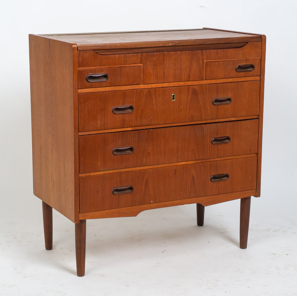 DANISH TEAK VANITY CHEST OF DRAWERS C. 1960S: Key included. Top opens to reveal compartment. Denmark, circa 1960s. Dimensions: H 30.5" x W 28.25" x D 15.75". Conditions: Wear consistent with age and use including dings and rubs. Missing mirror to