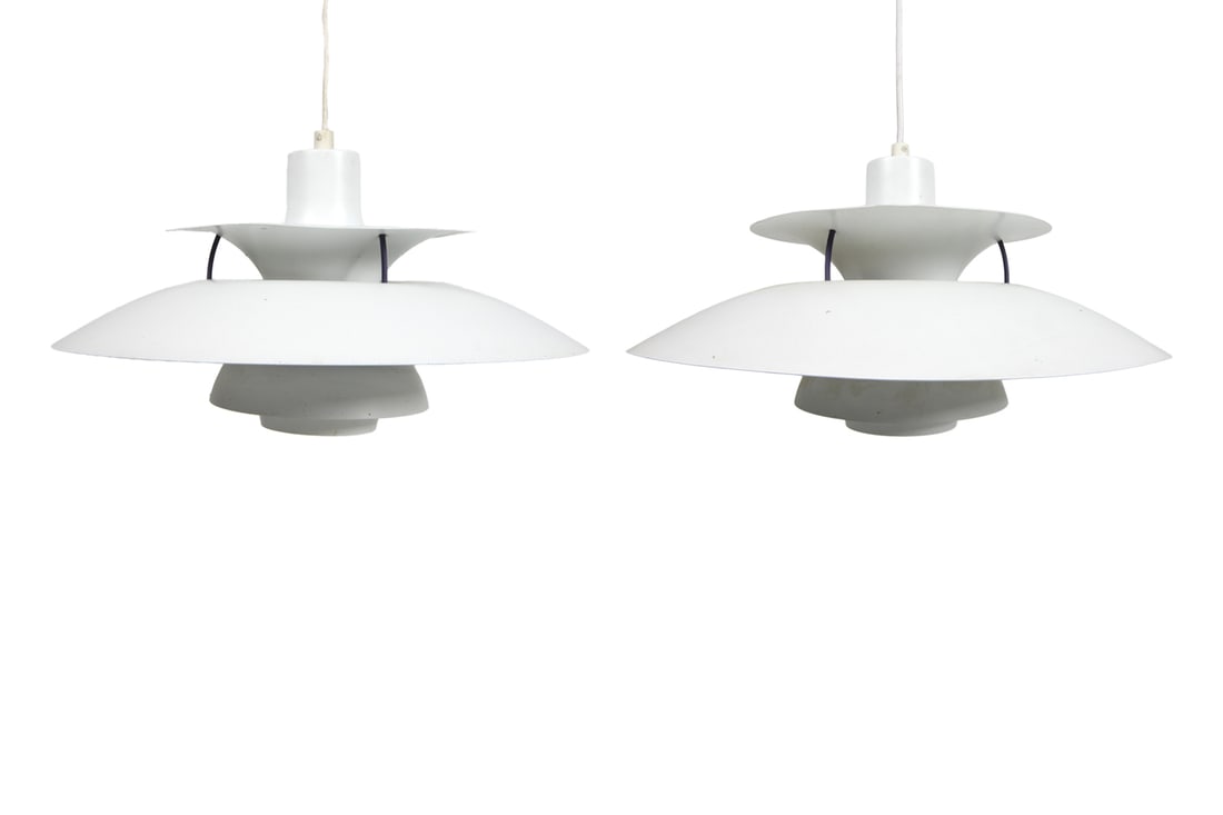 PAIR OF POUL HENNINGSEN PH5 SAUCER PENDANT LIGHTS: Aluminum shades in tiered design. For Louis Poulsen. Denmark, circa 1970s. Dimensions: H 9.5" x Dia. 19.5". Condition: Wiring untested. Wear consistent with age and use including dings and rubs.