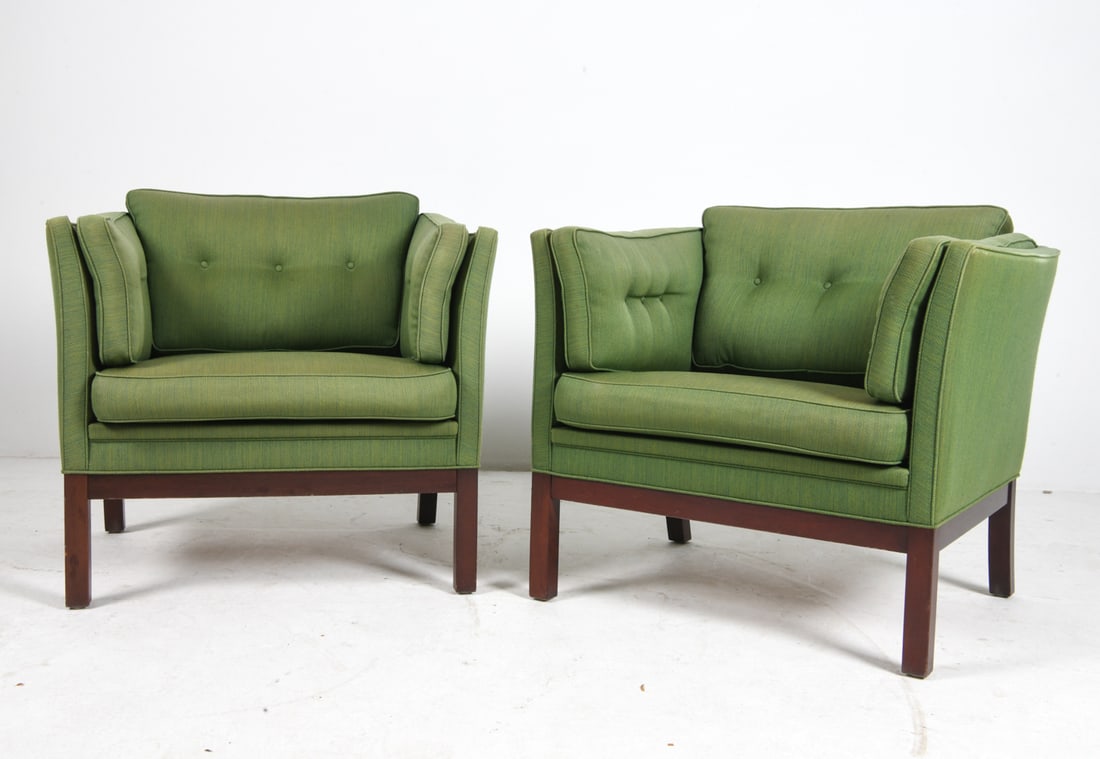PAIR OF VATNE MOBLER STYLE BEECH LOUNGE CHAIRS: Beech frames with green upholstery. Norway, circa 1970s. Dimensions: H 27" x W 39.25" x D 28.5" x Sh 16.5". Condition: Wear consistent with age and use, Scuffs and rubs to wood. Few faint rubs to fabr