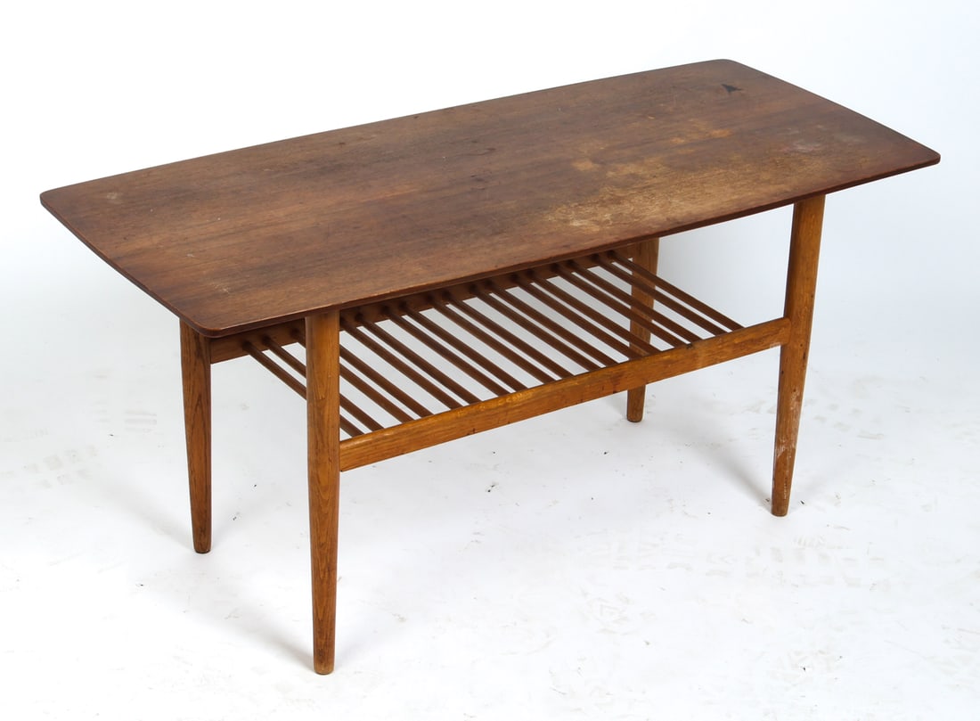 GRETE JALK STYLE DANISH TEAK COFFEE TABLE C. 1960S: Teak coffee table with slat shelf. Denmark, circa 1960s. Dimensions: H 20.75" x W 40" x D 18". Condition: Scuffs and rubs present. Wear consistent with age and use, including scratches and surface