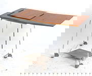 DANISH TEAK TYPEWRITER TABLE CART C. 1970S: Teak typewriter table with (1) drop-leaf. Steel legs with vinyl foot rest. Denmark, circa 1970s. Dimensions: H 25.75" x W 21" x D 19.25". Leaf W 17.75". Condition: Wear consistent with age and use,