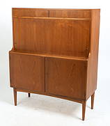 ATTR. H. P. HANSEN DANISH TEAK CABINET C. 1960S: Key Included. Lighted cabinet with frosted decorated mirror backing. Apparently unmarked. Denmark, circa 1960s. Dimensions: H 48.25" x W 39" x D 16.5". Condition: Wear consistent with age and use