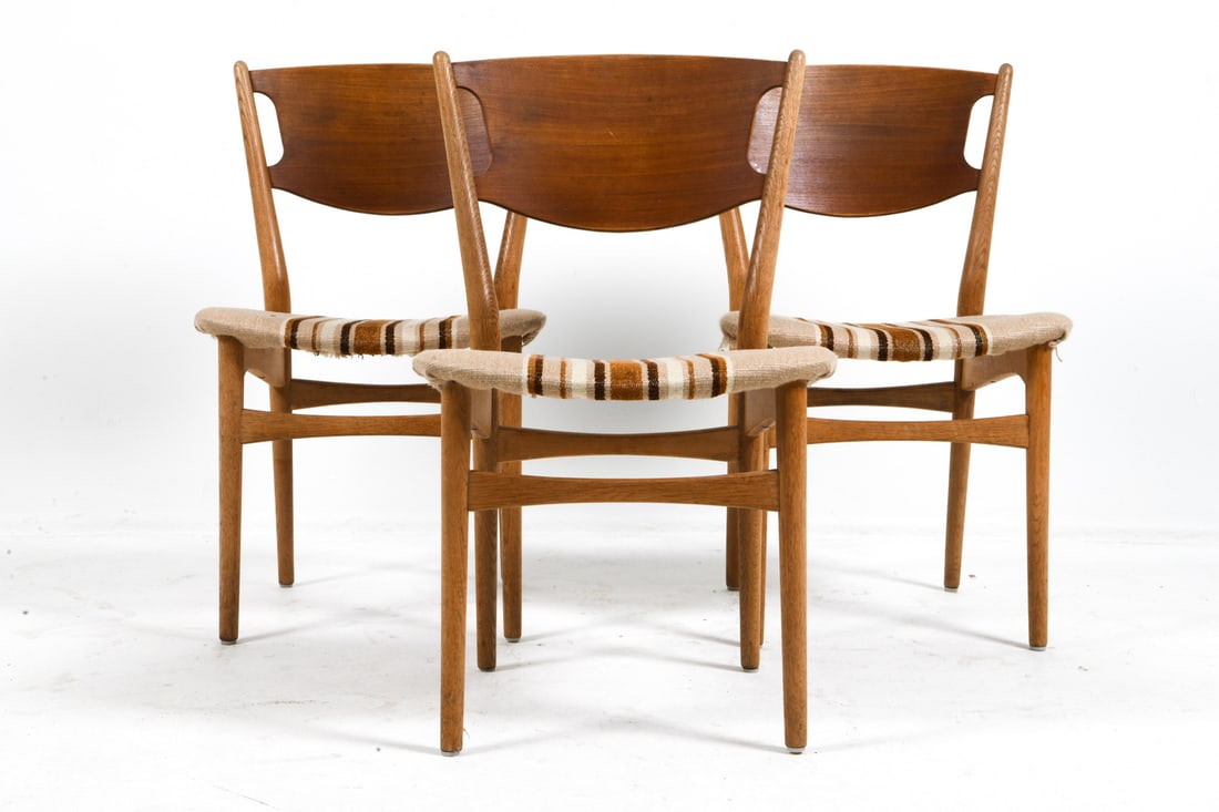 (3) HELGE SIBAST M. 42A TEAK DINING CHAIRS C.1960S: Teak frames with striped upholstered seats. Apparently unmarked. Denmark, circa 1960s. Dimensions: H 34" x W 20" x D 17" x SH 18". Condition: Some scuffs. Stains to upholstery. Wear consistent with