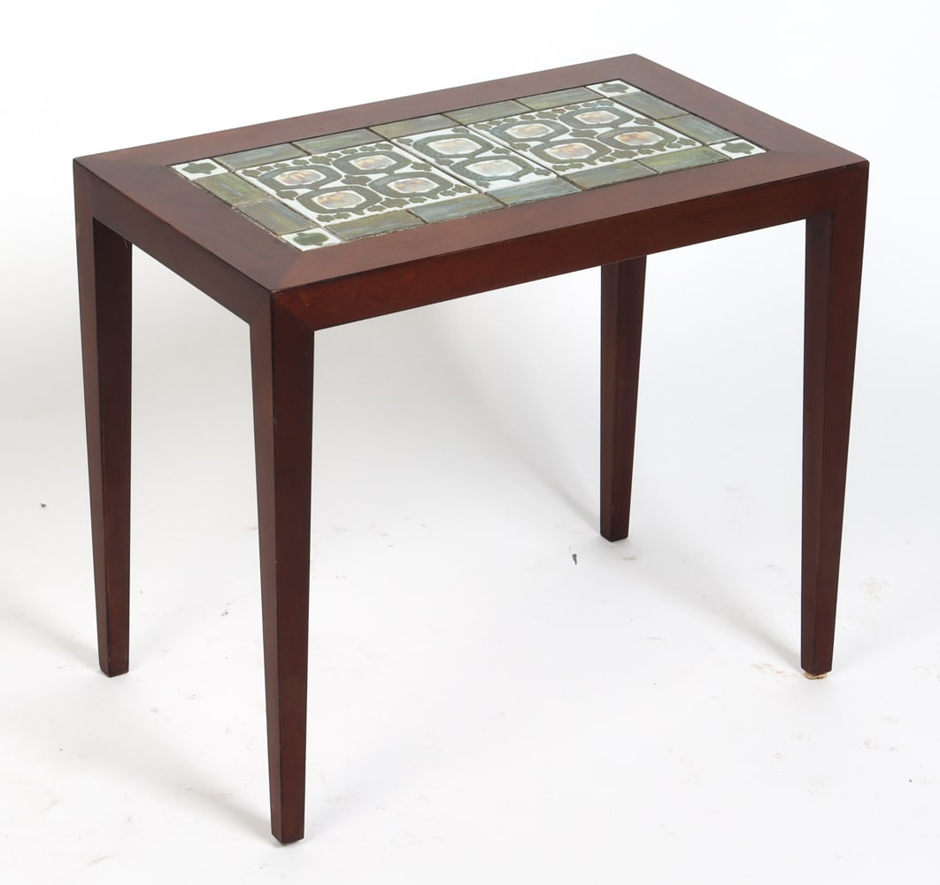 SEVERIN HANSEN ROSEWOOD & TILE SIDE TABLE C. 1960S: In collaboration with Royal Copenhagen. Rosewood side table with ceramic tiles inlaid to top. Tagged underneath. Denmark, circa 1960s. Dimensions: H 20" x W 23" x D 14". Conditions: Wear consistent