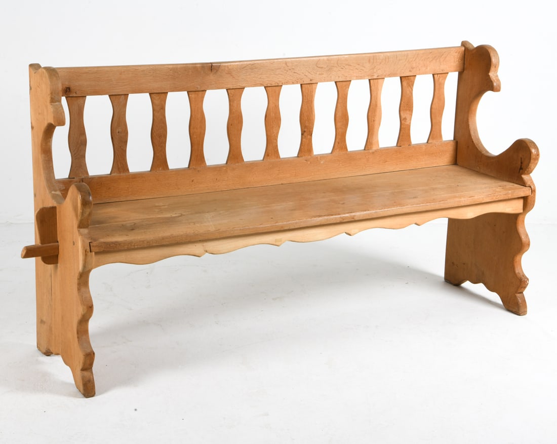 ALMUE STYLE SWEDISH OAK BENCH C. 1930S: Oak bench with sculptural carved sides. Sweden, circa 1930s. Dimensions: H 36" x W 67" x D 18". Condition: Minor rubs and dings. Wear consistent with age and use.