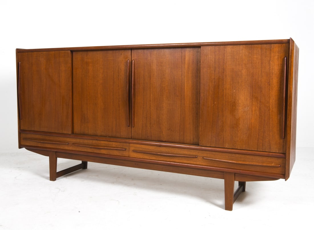 DANISH TEAK SIDEBOARD C. 1960S: Adjustable shelves. Dry bar to center cabinet with frosted decorated mirror. Denmark, circa 1960s. Dimensions: H 35.25" x W 70.75" x D 16.25" Condition: Wear consistent with age and use including