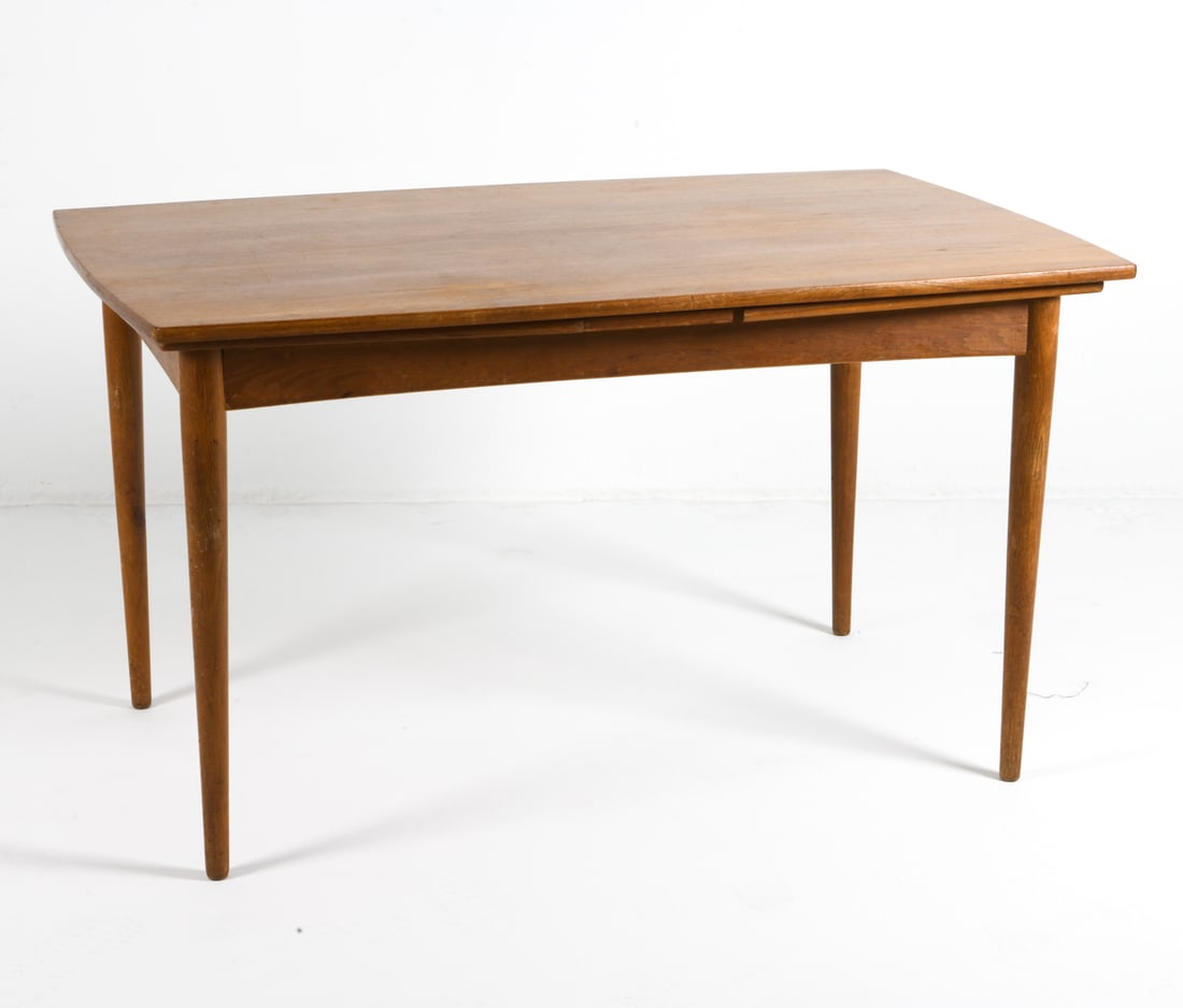 DANISH TEAK EXPANDING DINING TABLE C. 1960S: (2) Leaves included, stored within table. Denmark, circa 1960s. Dimensions: H 30" x W 53" x D 33". Leaf W 20.5". Condition: Rubs and dings to legs. Few faint water rings to top. Wear consistent with a