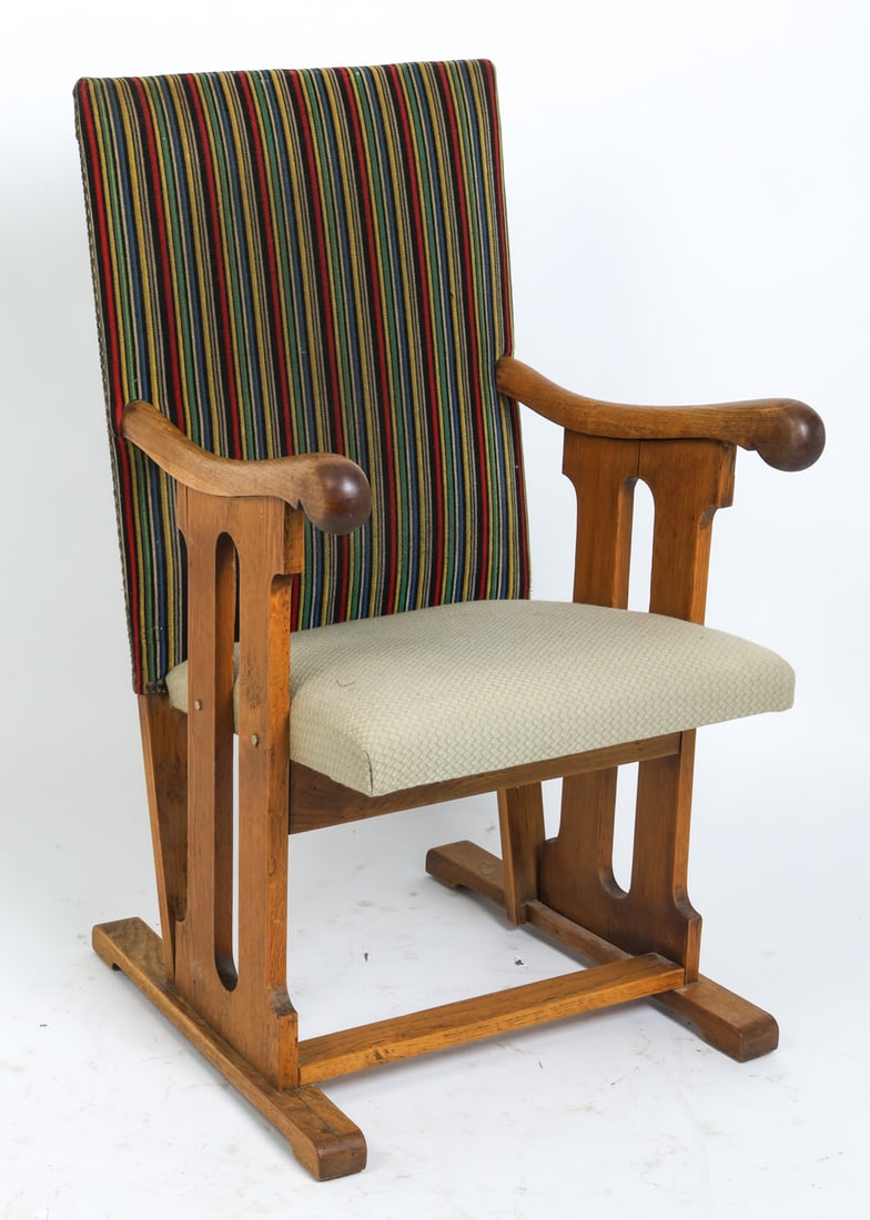 ARTS & CRAFTS STYLE DANISH OAK ARMCHAIR C. 1970S: Oak frame with upholstered seats. Denmark, circa 1970s. Dimensions: H 40.25" x W 24.25" x D 25" x Sh 19.25". Condition: Wear consistent with age and use including faint rubs and dings to wood. Rubs to