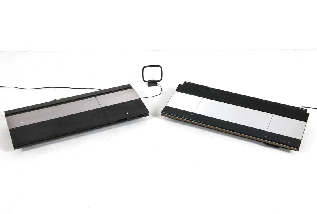BANG & OLUFSEN BEOCENTER GROUPING C. 1980S: Grouping of (2) Beocenter systems, includes the Beocenter 2200 turntable and the Beocenter 9000 radio and cassette systems. Designed by Jacob Jensen. Denmark, circa 1980s. Dimensions: H 4.5" x W 30" x