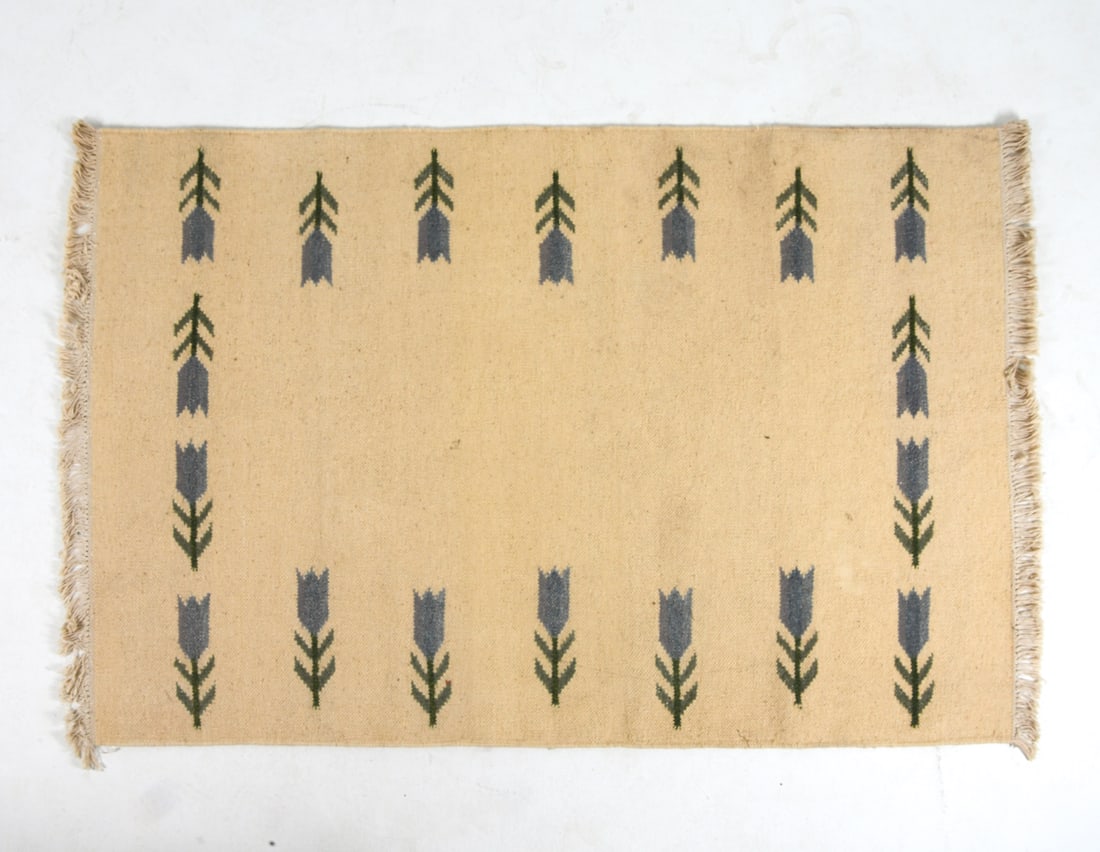 DANISH FLAT WEAVE WOOL RUG: Hand-knotted cream tone rug with floral design. Mid 20th century. Dimensions: L 84" x W 54". Condition: Slight discoloration to fringe and pile. Wear consistent with age and use.