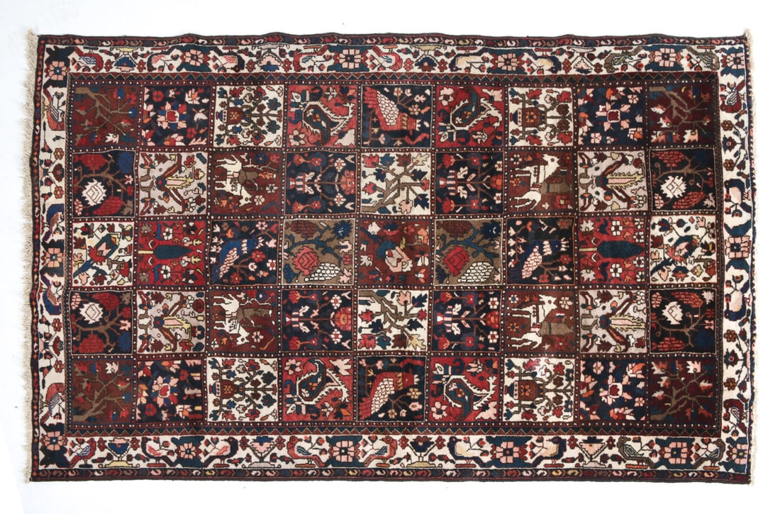 IKEA PERSIAN 'BAKHTIARI' RUG: Hand-knotted wool rug. Tag on back. 20th century. Dimensions: H 101.5" x W 63.5". Condition: Wear consistent with age and use including faint sun-fading.