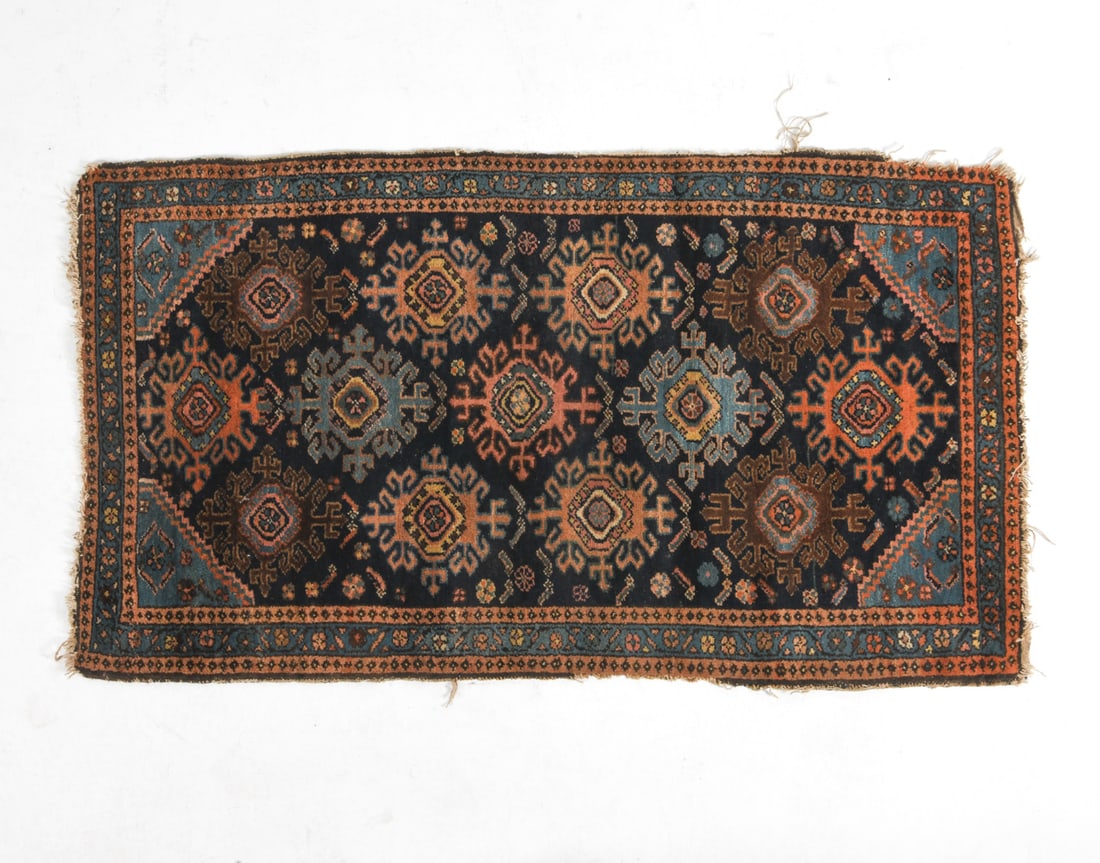 BALUCHI ORIENTAL RUG: Hand-knotted wool rug with geometric design. 20th century. Dimensions: L 59" x W 33". Condition: Some losses to fringe and fraying to edges. Cleaning recommended.