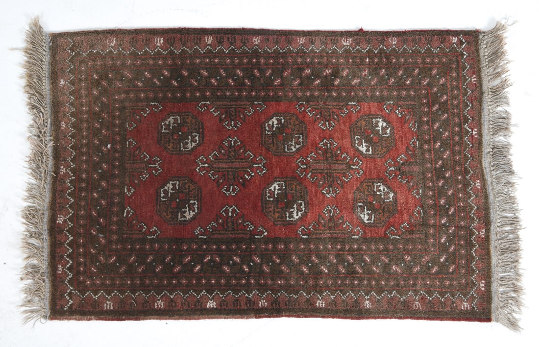 AFGHAN AKHCHE ORIENTAL RUG: Hand-knotted wool rug with red, black, and white geometric patterns. 20th century. Dimensions: L 52" x W 31". Condition: Showing signs of wear including sun fading. Wear consistent with age and use.