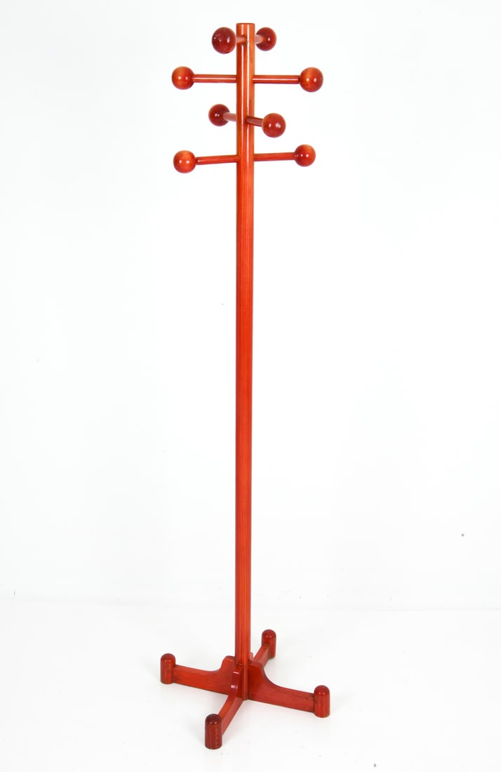 ITALIAN LACQUERED BEECH COAT RACK C. 1980S: Red lacquered beech frame. Multiple peg arms in spherical ends. Four legs base. Italy, circa 1980s. Dimensions: H 69", Dia. 19.5" Condition: Wear consistent with age and use.