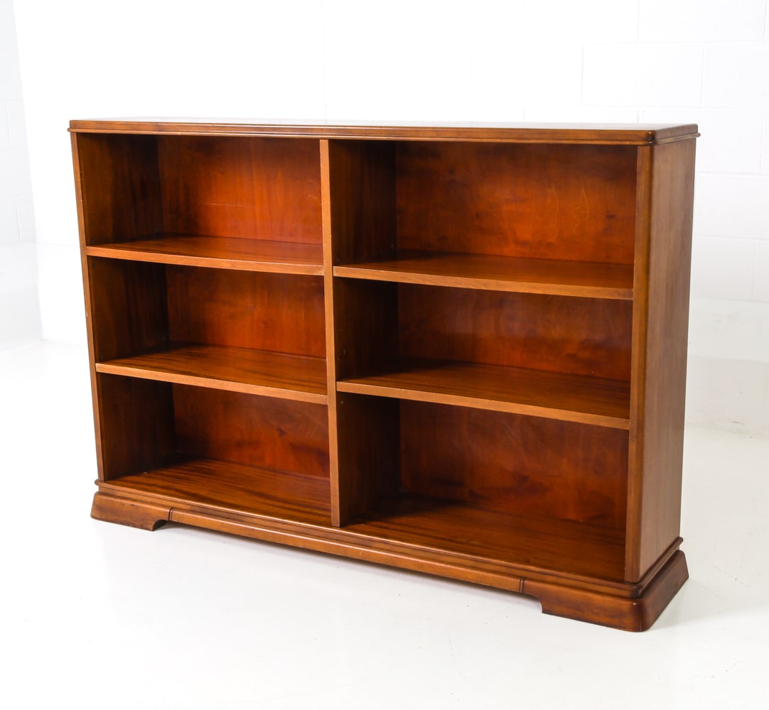 STAER MOBEL DANISH MAHOGANY BOOKSHELF C. 1960S: Two sections with adjustable shelves and plinth bases. Maker stamp to the backside. Denmark, circa 1960s. Dimensions: H 40.5" x W 59.25" x D 12.25" Condition: Scratches, rubs, and water marks to top,