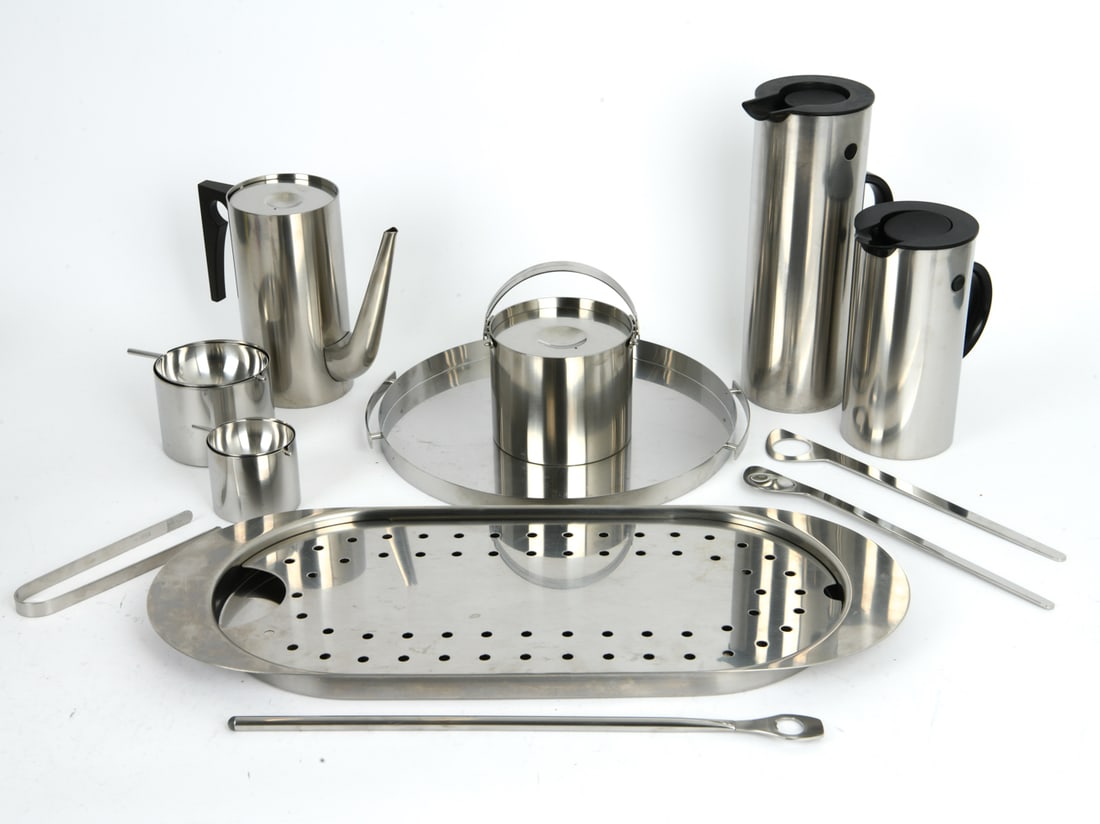 MAGNUSEN & JACOBSEN FOR STELTON TEA SERVICE SET: Model "Cylinda" line stainless steel coffee and tea service collection. Designed by Erik Magnusen and Arne Jacobsen for Stelton. Engraved on underside. Denmark, circa 1960's. Dimensions: (Largest) L 2