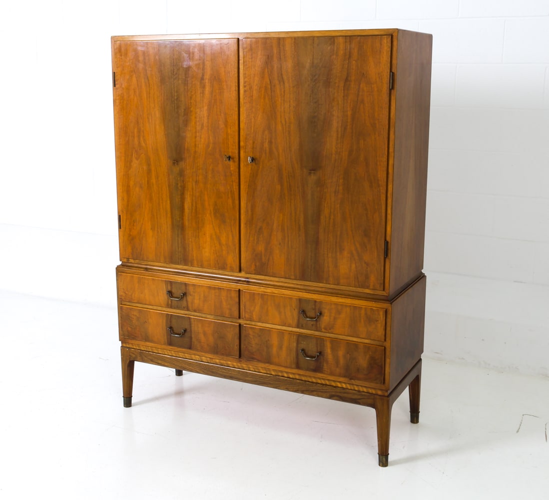 OLE WANSCHER STYLE DANISH MAHOGANY CABINET C.1960S: Two keys included. Adjustable shelve. Denmark, circa 1960s. Dimensions: H 59" x W 44" x D 16.75" Condition: Wear consistent with age and use including dings and rubs to top and side. sun fading and wa