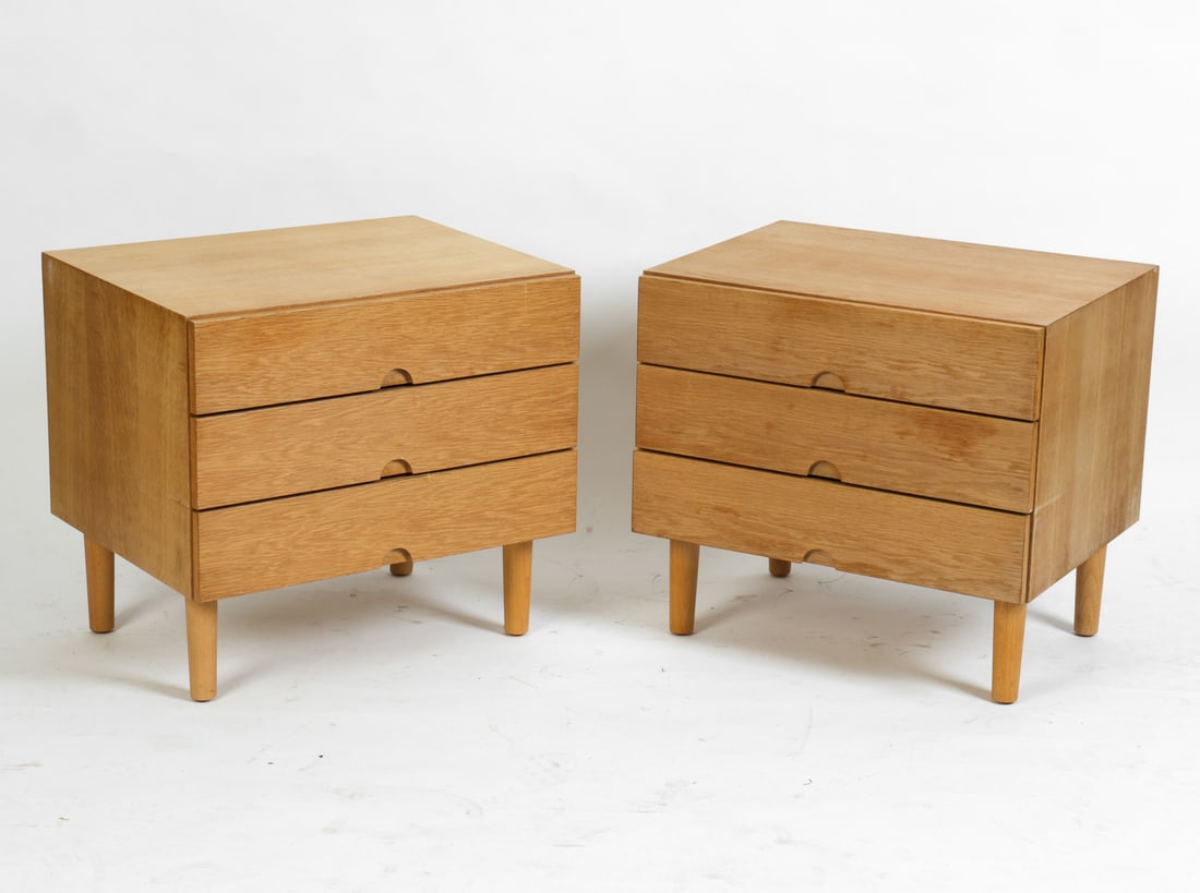 PAIR OF SVEN ELLEKAR FOR BRAMIN OAK NIGHTSTANDS: Oak frame side chest or nightstands. Three drawers with recessed pulls on tapered legs. Tagged to back. Denmark, circa 1960s. Dimensions: H 22" x W 23.75" x D 18.5" Condition: Wear consistent with age