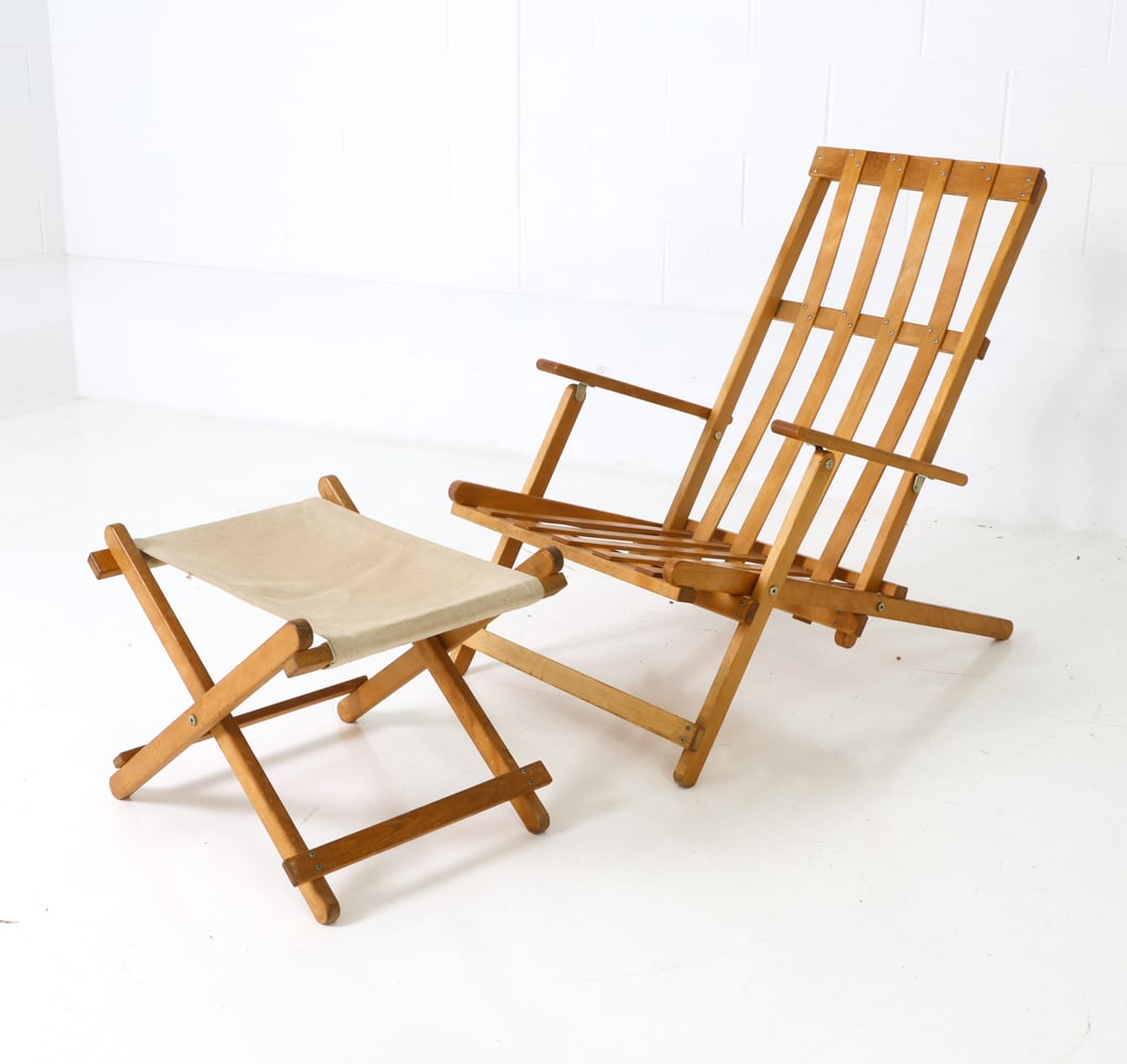 ATTR. BORGE MOGENSEN BEECH FOLDING CHAIR & OTTOMAN: Beech wood folding lounge chair with matching footstool/ottoman featuring slatted design and canvas sling for the ottoman. Apparently unmarked. Denmark, circa 1970s. Dimensions: (Chair) H 34.5" x W 23