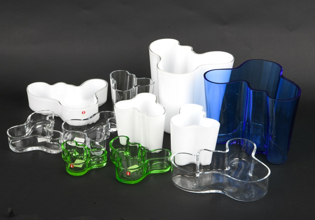 ALVAR AALTO FOR IITTALA GLASS VASE GROUPING 1960S: Model "Savoy" Aalto vase. Clear, white opal, blue, and green glass vases in various size. Marked to surface. Finland, circa 1960s. Dimensions: (Blue Bowl) H 6.25" x W 7.25" Conditions: Wear