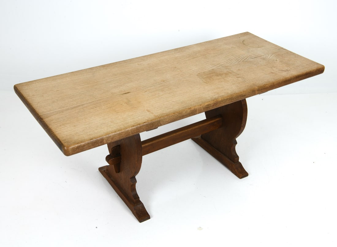 REFECTORY STYLE SCANDINAVIAN OAK DINING TABLE: Trestle base console table in pine frame. Plank top with softened edge, supported by shaped trestle ends joined by a pegged stretcher. European, 20th century. Dimensions: H 22.25" x W 52.75" x D