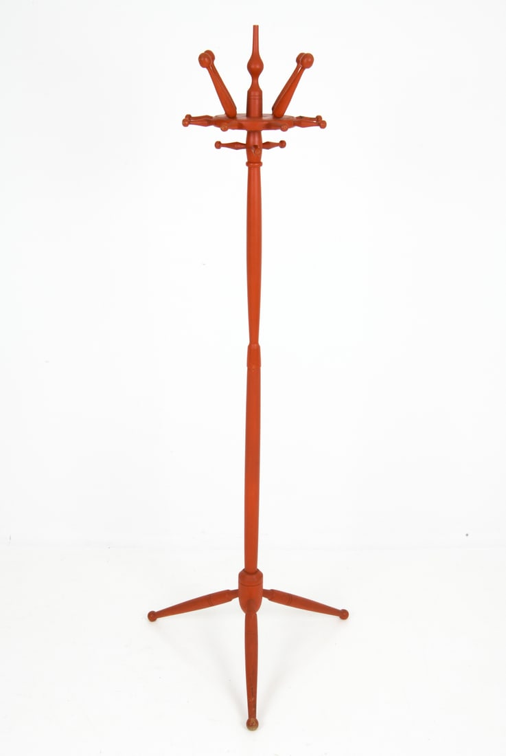 SCANDINAVIAN PAINTED BEECH COAT RACK C. 1960S: Red painted beech frame coat stand with multiple ball-ended hooks. Circa 1960s. Dimensions: H 65.25" x Dia. 23.5" Condition: Rubs and scuffs to stem, hooks and top, Wear consistent with age and use.