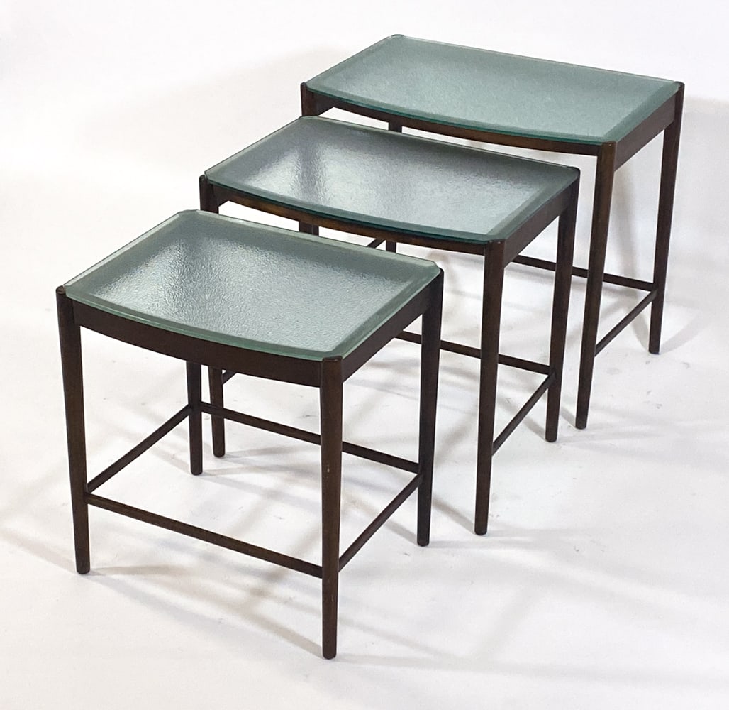 SCANDINAVIAN BEECH & GLASS NESTING TABLES C. 1970S: Beech frames with textured glass tops. Denmark, circa 1970s. Dimensions: Largest H 20.75" x W 22.5" x D 14.25". Condition: Scuffs and dings to wood, wear consistent with age and use. Clev 40