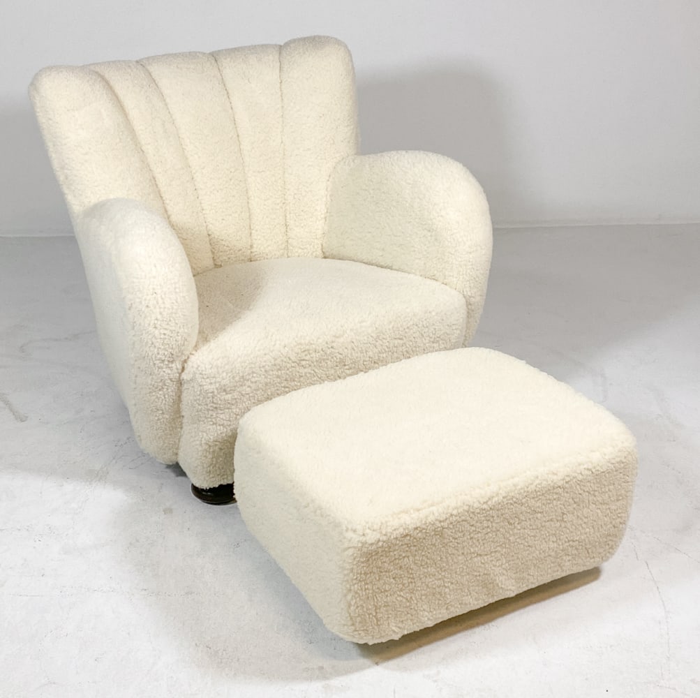 FLEMMING LASSEN STYLE LAMBSWOOL CHAIR & OTTOMAN: Channel back lounge chair. Together with matching ottoman. Lambswool upholstery with beech feet. Denmark, circa 1960s. Dimensions: Chair H 32.5" x W 34" x D 26" x SH 13.5". Ottoman H 13" x W 25" x D 1