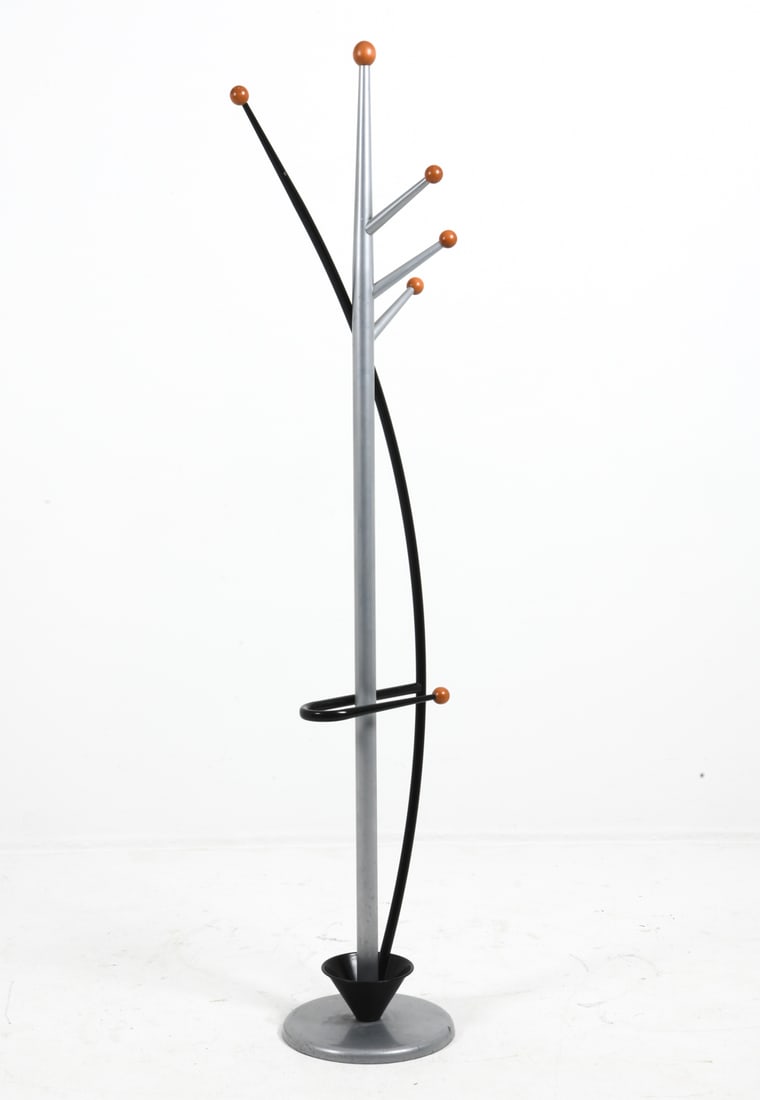 ALFAX SWING COAT RACK C. 1970S: Sculptural steel coat rack with beech wood accents. Circa 1970s. Dimensions: H 72.25" x W 12.75" x D 17" Condition: Wear consistent with age and use including minor rubs and scratches. Minor surface s