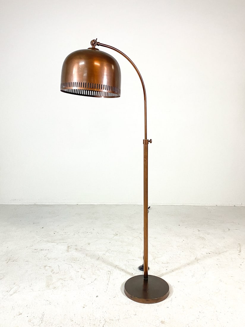 SCANDINAVIAN COPPER DOME SHADE FLOOR LIGHT 1960S: Copper floor light with dome shade. Cut out decoration to shade rim. Adjustable height. Scandinavian, circa 1960s. Dimensions: H 56.5" x W 23" x D 12". Condition: Wiring untested, European plug. Few s