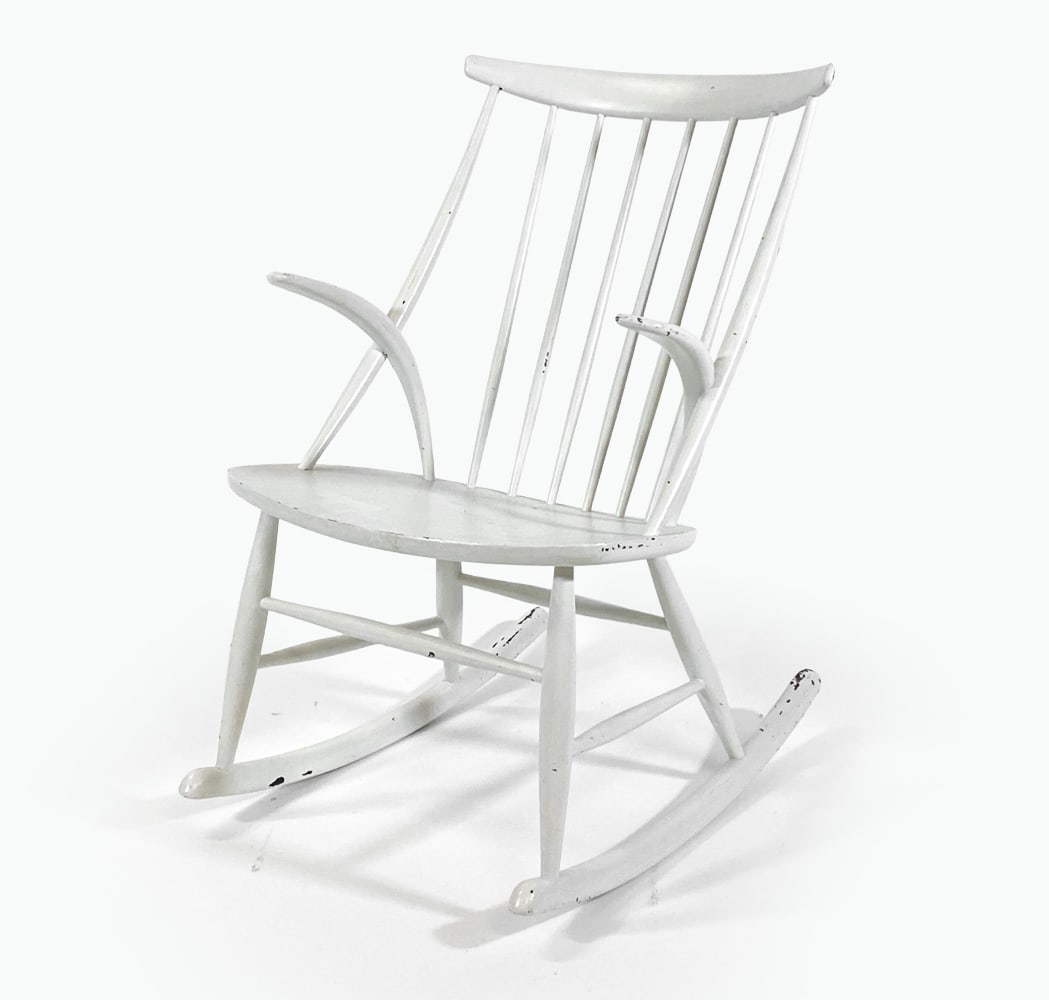 ILLUM WIKKELSO MODEL IW3 DANISH ROCKING CHAIR: For Niels Eilersen. White lacquered beech. Denmark, circa 1950s. Dimensions: H 36.5" x W 21" x D 29" x SH 16.5". Condition: Minor losses to painted finish. Wear consistent with age and use. H14 Per