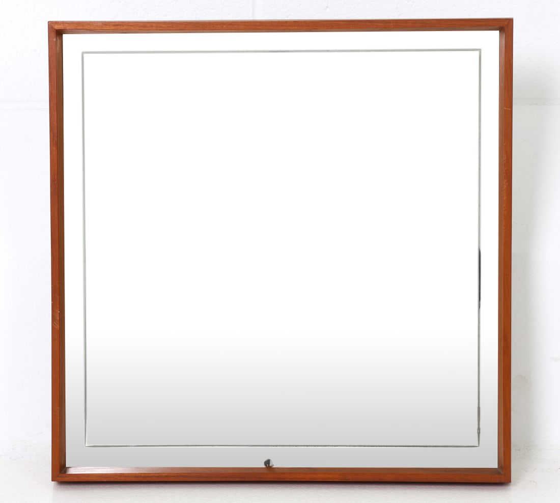 HILLEBRAND GERMAN TEAK LIGHTED MIRROR C. 1960S: Teak frame lighted mirror. Marked to back. Germany, circa 1960s. Dimensions: H 20.75" x W 20.75" x D 3.5" Condition: Untested. Surface marks and scratches consistent with age and use. PQ184