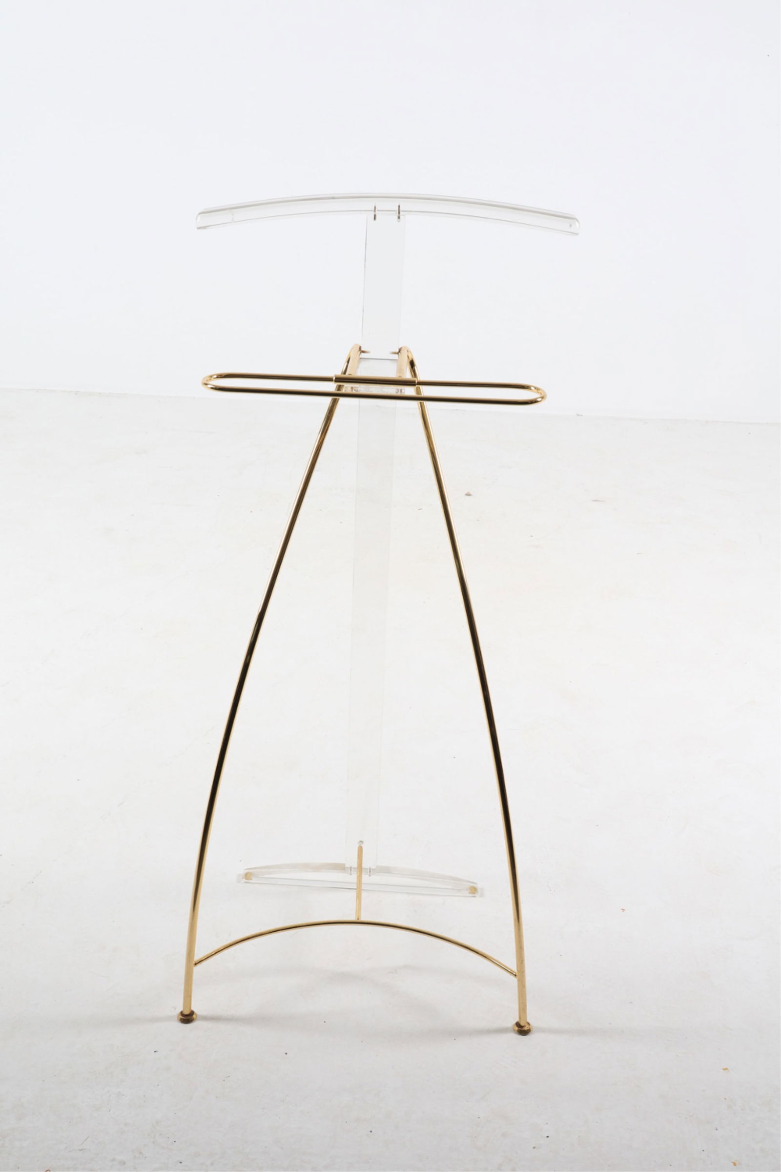 SCANDINAVIAN BRASS AND LUCITE COAT RACK: Dimensions: H 43.25" x W 19.5" x D 13.25". Condition: Scattered scuffs and dings to lucite, brass. Wear consistent with age and use.