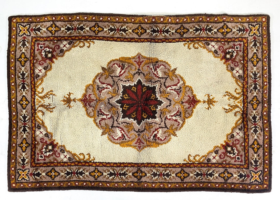 MID-CENTURY ORIENTAL SERAPI RUG: Brown and beige geometric and floral pattern. Mid 20th century. Dimensions: L 84 " x W 60 ". Condition: Slight discoloration. Wear consistent with age and use.