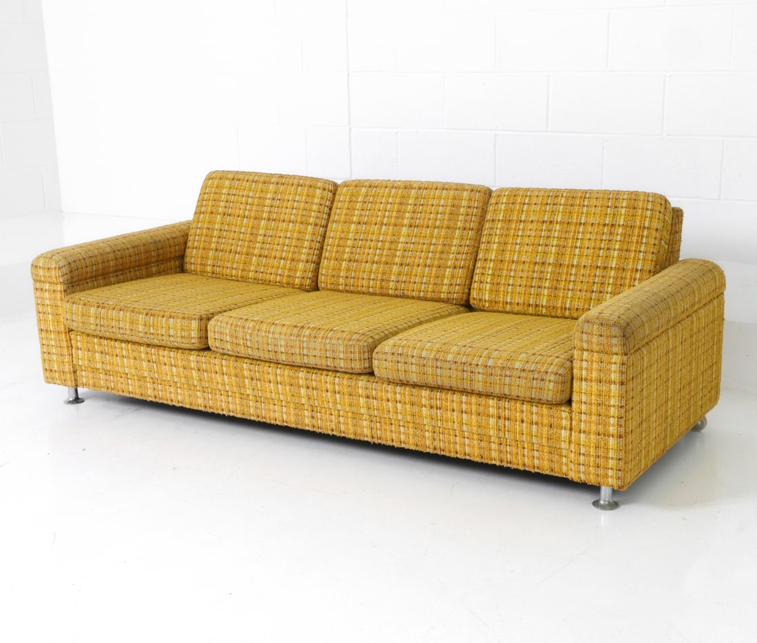 STYLE OF DUX SWEDISH TWEED SOFA C. 1960S: Three seat and back cushions with metal legs. Textured woven upholstery in shades of yellow, brown and cream. Sweden, circa 1960s. Dimensions: H 28" x W 78.5" x D 32" x Sh 14.75" Condition: Wear consi
